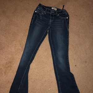 Jeans with diamonds on pockets